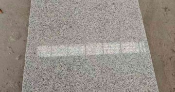 马鞍山芝麻白光面毛板