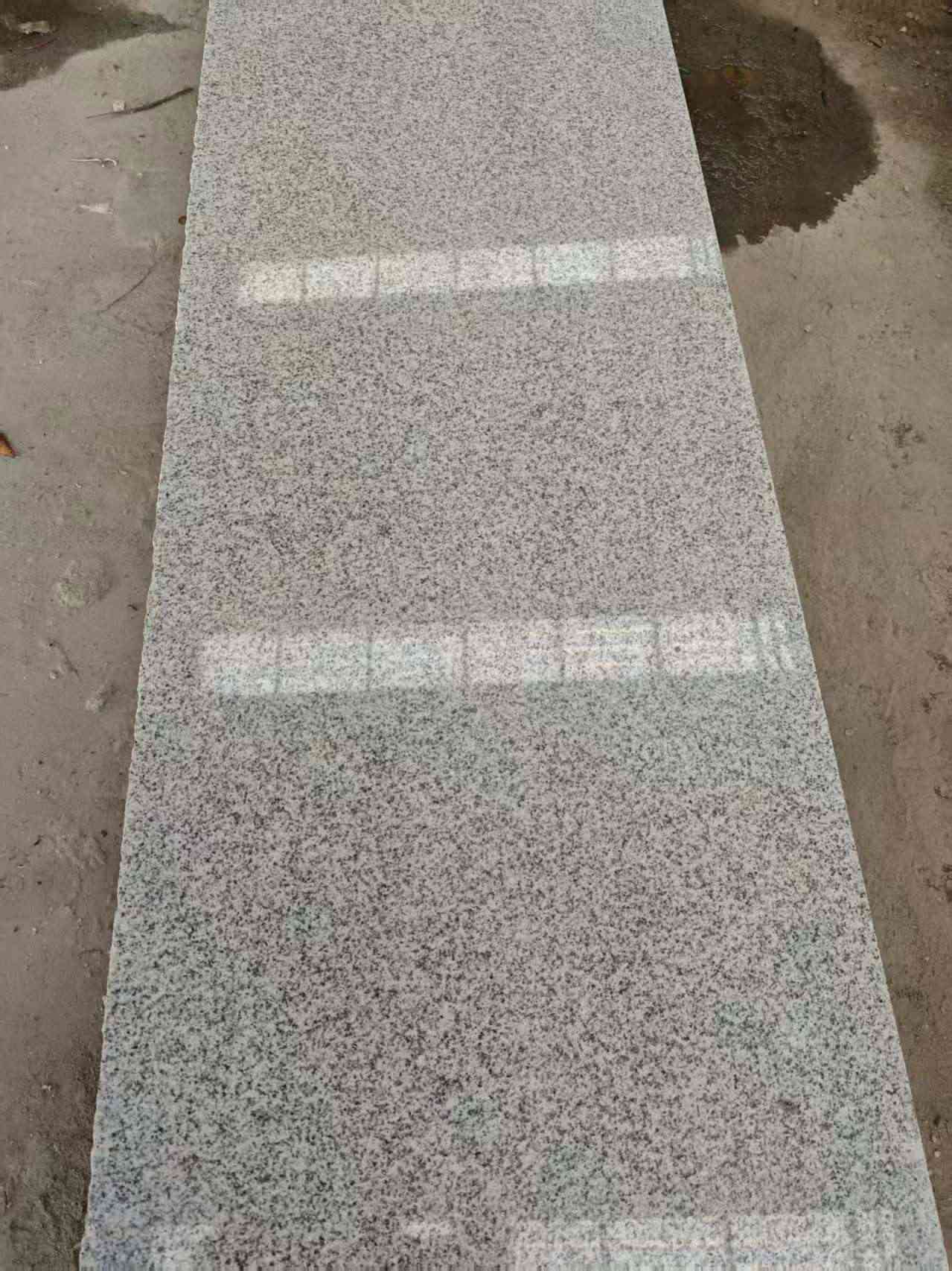 马鞍山芝麻白光面毛板